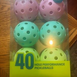 Pink, Blue, and Green Pickleballs Set